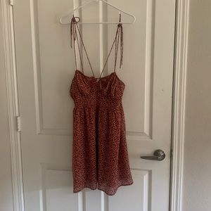 Red princess polly dress with little flowers.